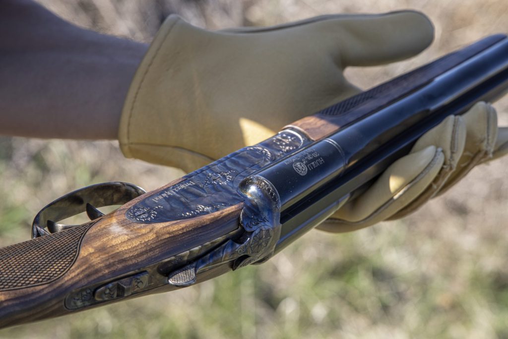 in-hand-display-cz-bobwhite-g2-project-upland-voted-best-side-by-side
