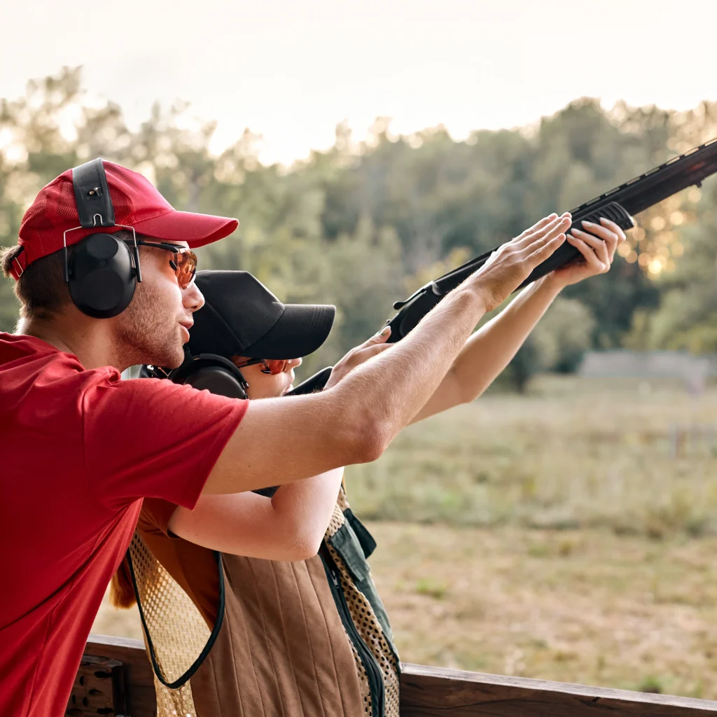 girl-learning-how-to-shoot-shotgun-at-skeet-range